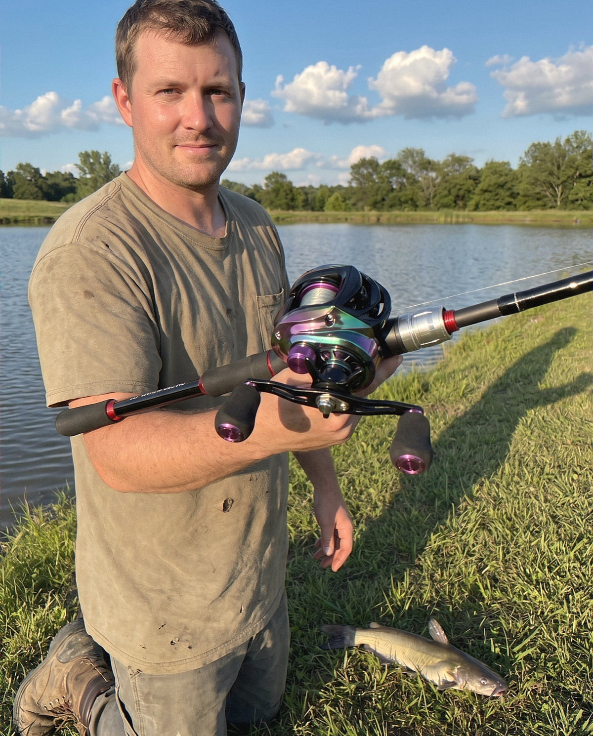 An angler on a pond bank with the Obalus UltimaCatch Pro rod and reel combo